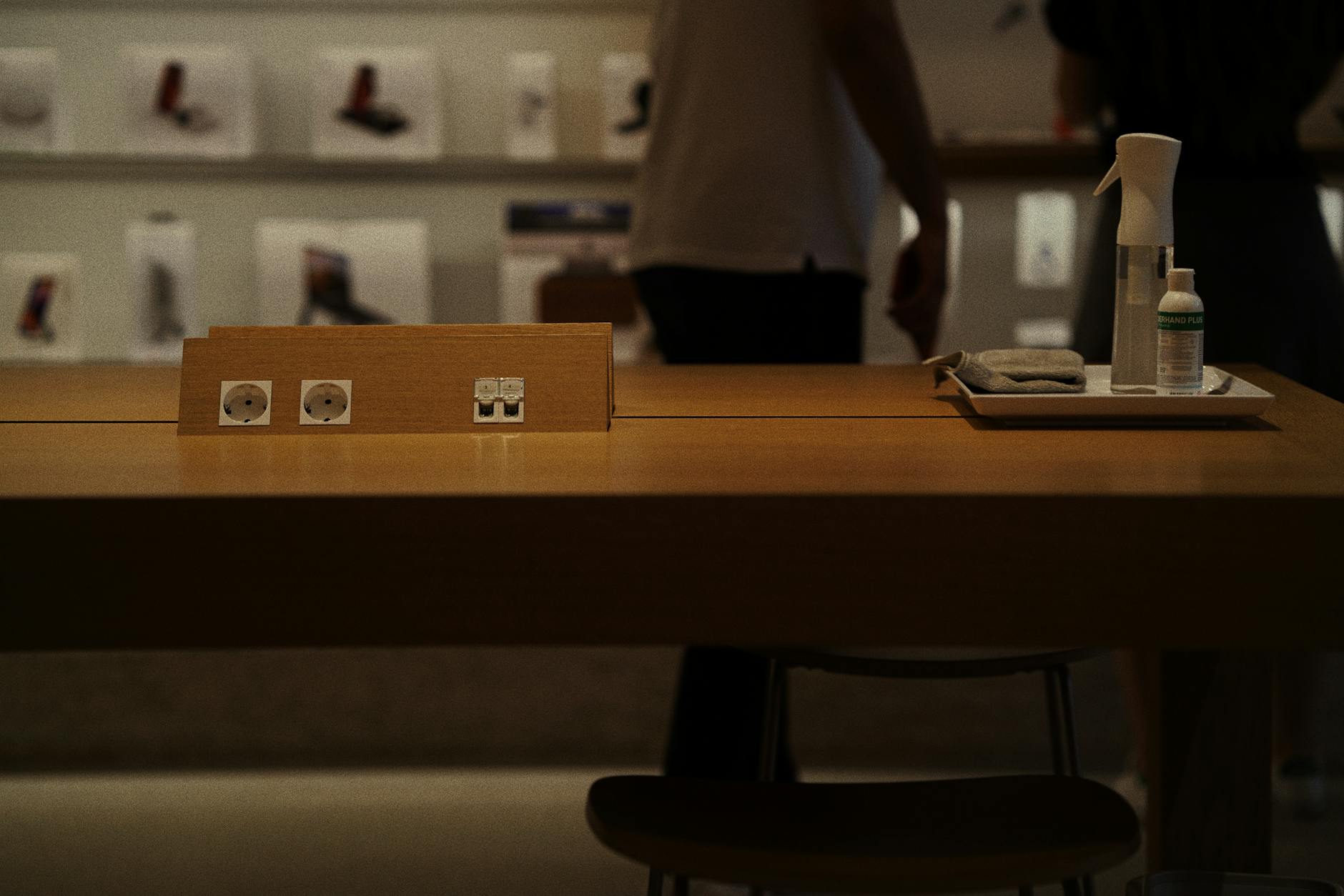 Modern electronics retail store interior with customers